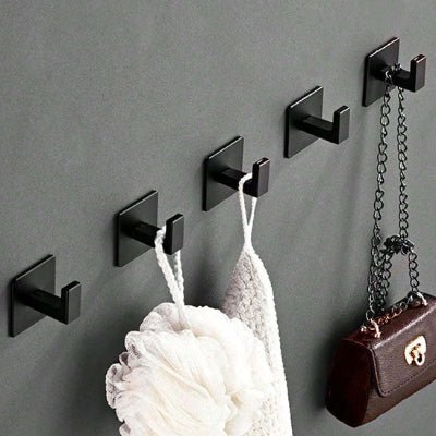 cinq crochets muraux minimaliste noir sac marron