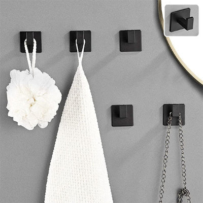 cinq crochets muraux minimaliste noirs un detail