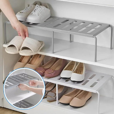 deux rangement de chaussures un blanc un gris un detail