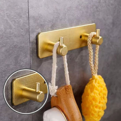 porte manteau mural dore deux crochets un detai