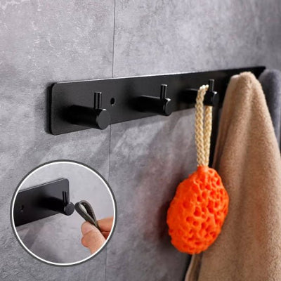 porte manteau mural noir quatre crochets un detail