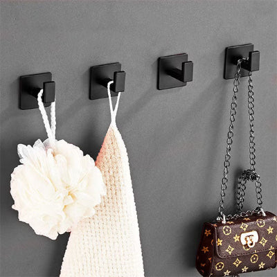 quatre crochets muraux noirs