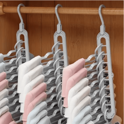 trois cintres plastique organisateur gris pleins