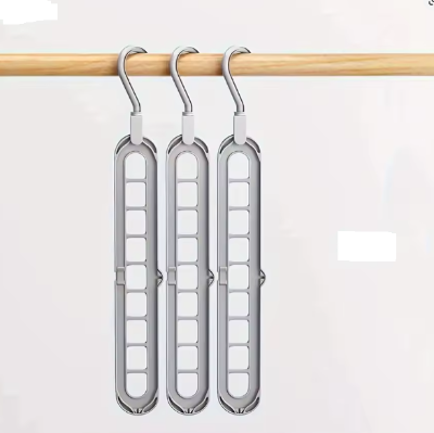 trois cintres plastique organisateur gris
