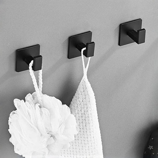 trois crochet muraux noirs serviette blanche