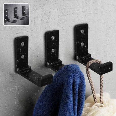 trois crochets muraux pliant design noirs ouverts un detail 